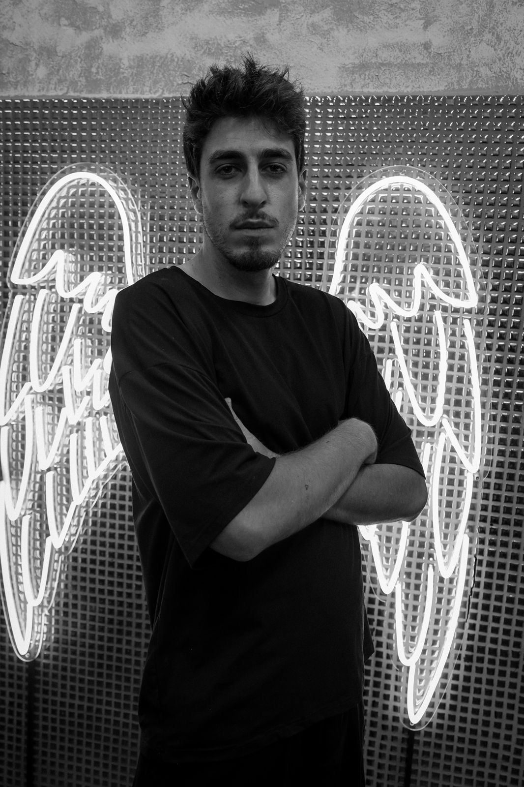 Portrait of GIORGOS, tattoo artist at Mykonos Ink Tattoo